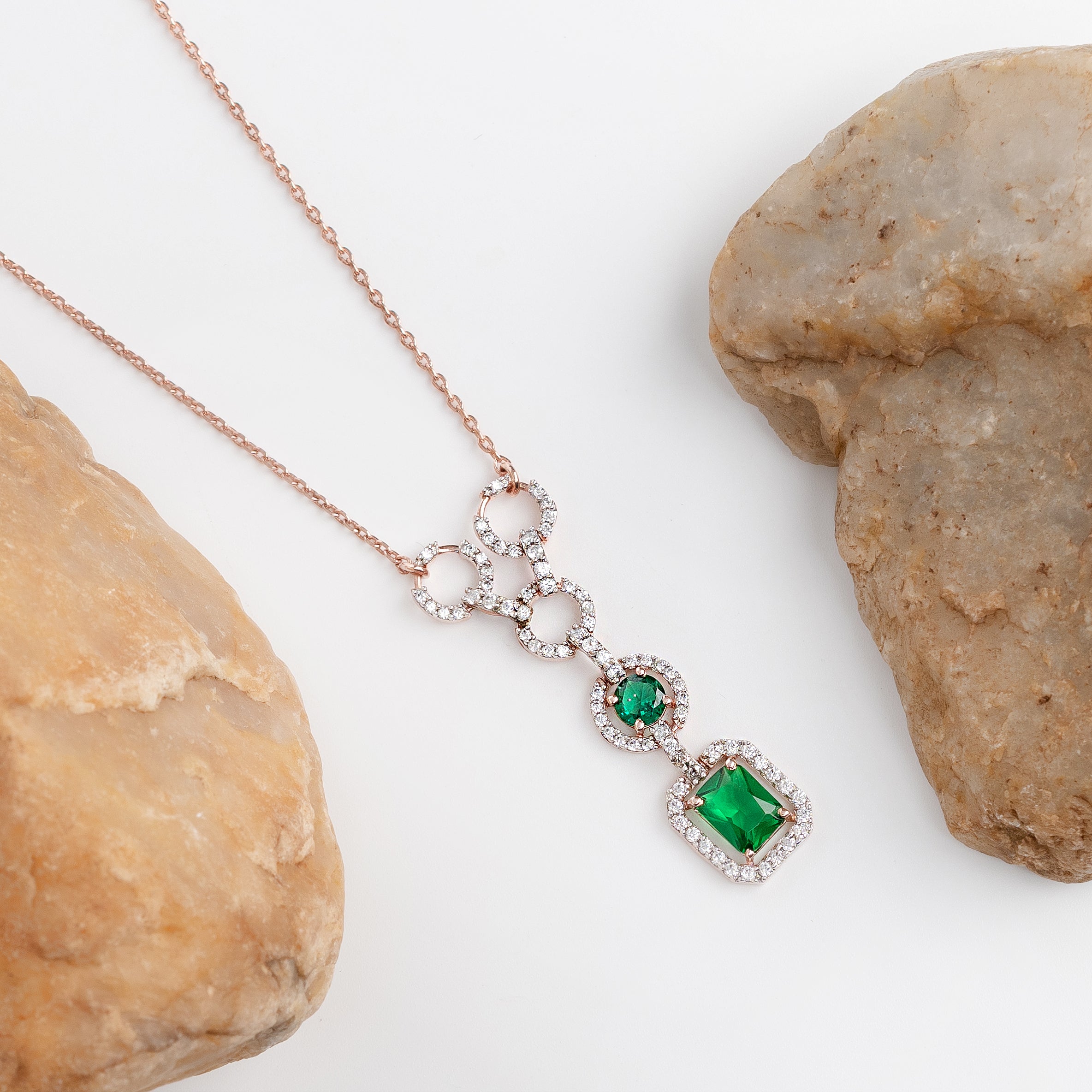Emerald Axis Drop – Premium Pendant Necklace in Rose Gold with Green Stones