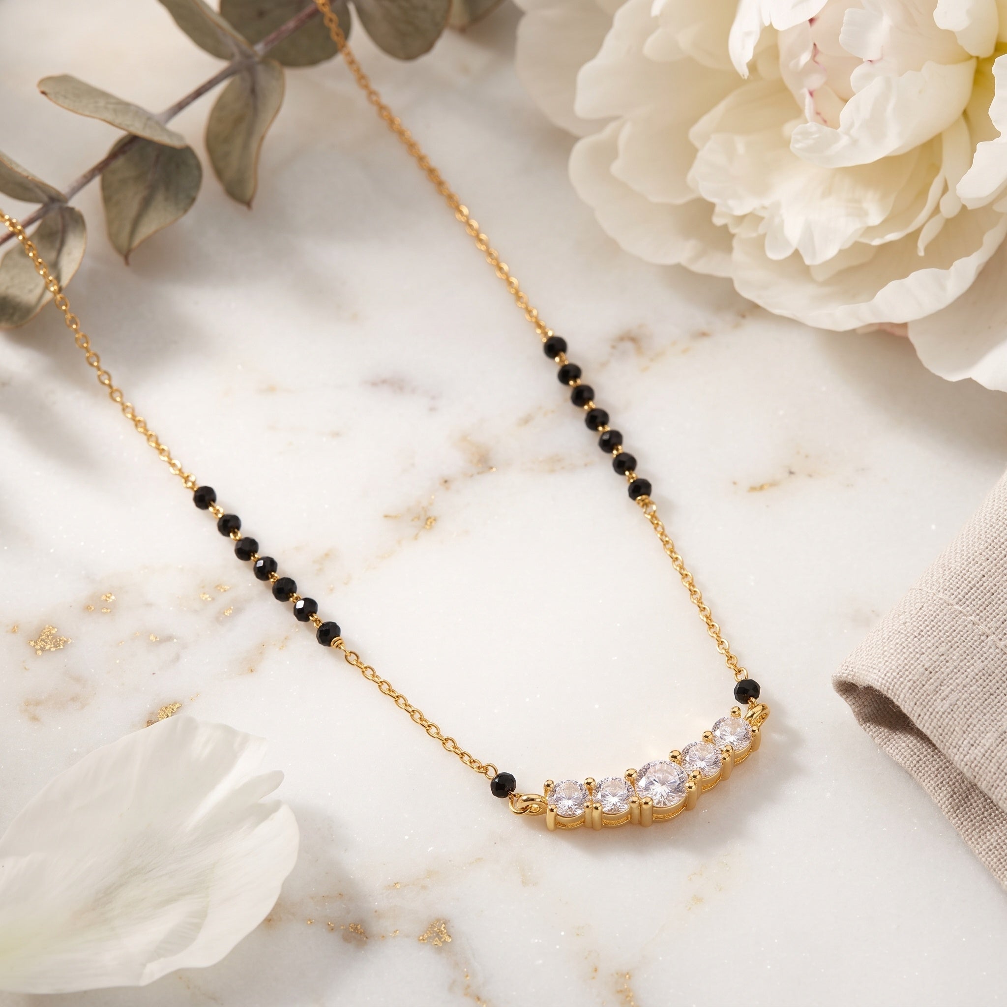 Celeste Curve – Premium Women’s Gold-Tone Mangalsutra with Black Beads